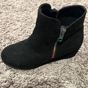 Brand New, her feet got too big and she never got to wear them